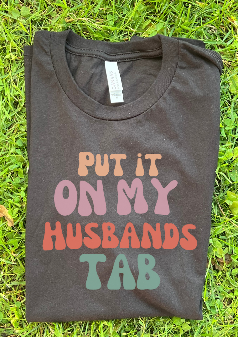 Put it on my husband's tab graphic tee